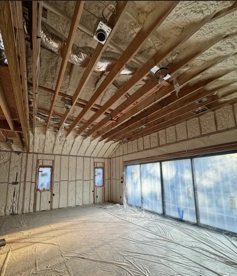 Interior walls and ceiling insulated with spray foam during new construction in Timonium